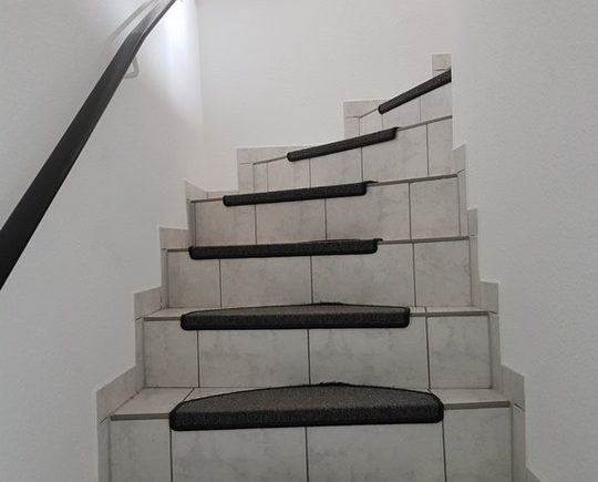 Treppe ins Obergeschoss